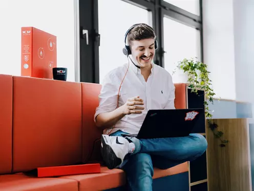 Student working on the move with headset