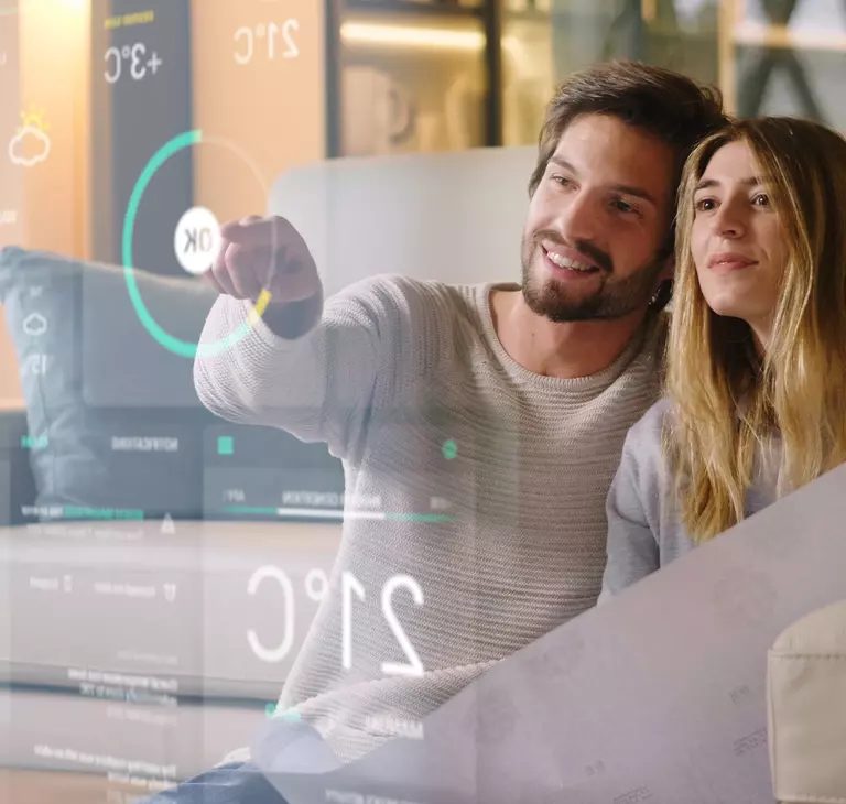 Couple looking at smartphone Couple looking at smartphone