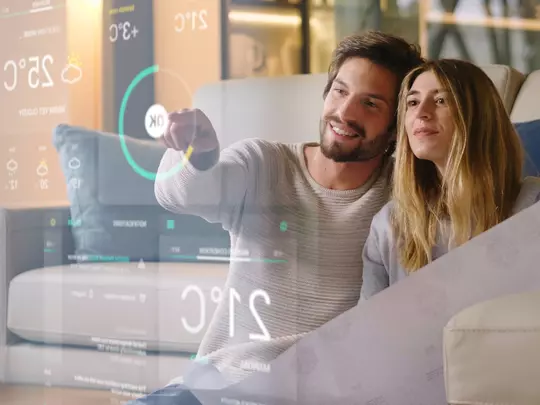 Couple looking at smartphone Couple looking at smartphone