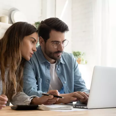 Couple looking at computer